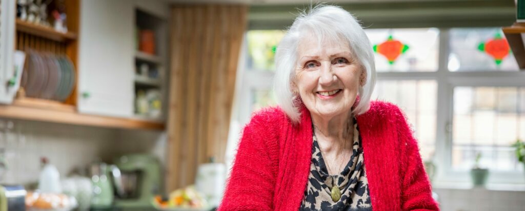 Older woman baking at home