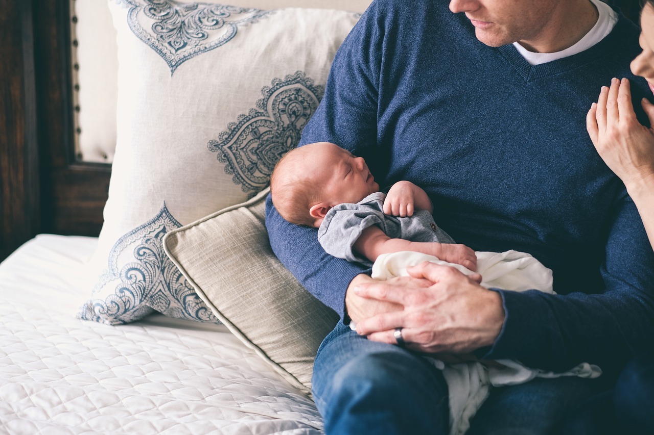 Man holding baby