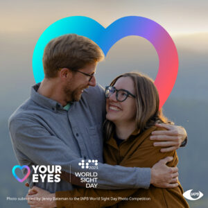 Love your eyes photo tile of a man and a woman hugging, both wearing glasses