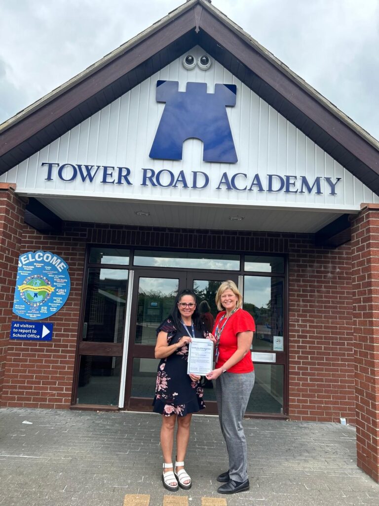 Pictured left to right, Alison Ward, Trust Attendance Leader at Tower Road Academy receiving the award from Sonia Currier, Children and Young People Programme Manager NHS Lincolnshire Integrated Care Board