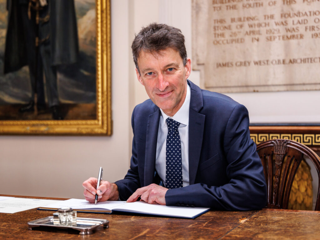 John-Turner-NHS-Lincolnshire-ICB-Chief-Executive-signing-the-Armed-Forces-Covenant