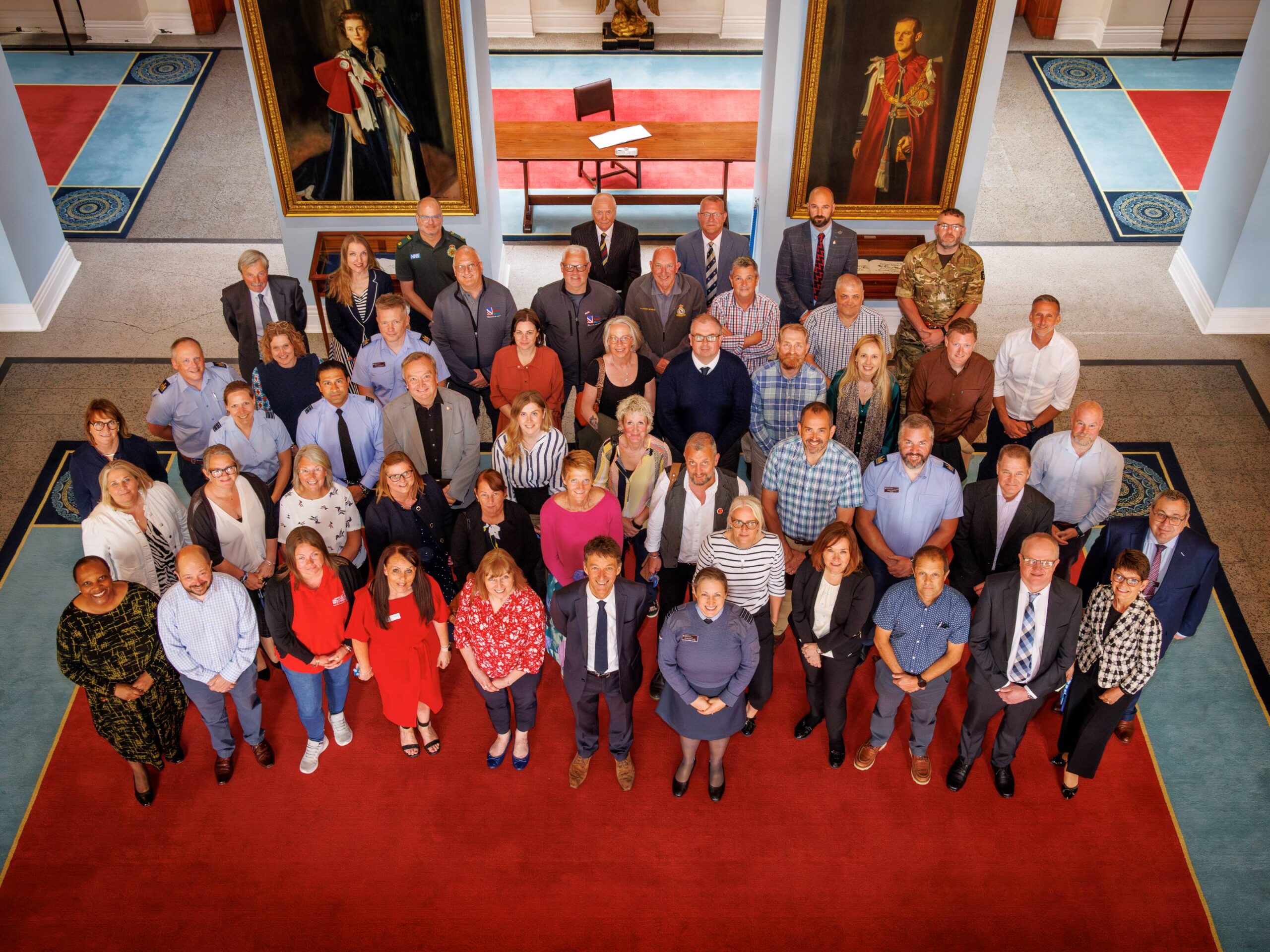 An overhead photograph of the attendees at the second Armed Forces & NHS Lincolnshire Symposium, RAF College, RAF Cranwell, Tuesday 3 June 2025 (credit: Andrew Wheeler, Photography and Media Services, Royal Air Force College Cranwell).