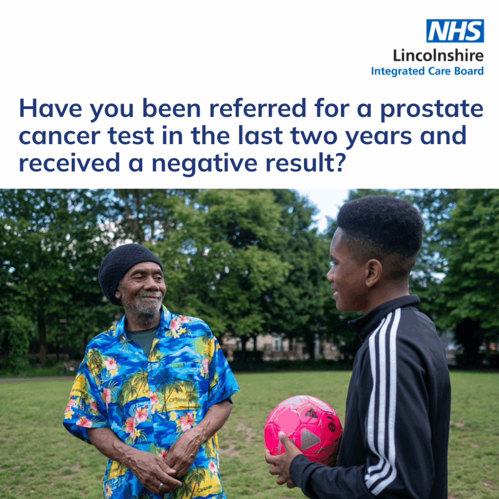 Two men stand in a park, one holding a bright pink soccer ball, surrounded by green trees and grass. "Have you been referred for a prostate cancer test in the last two years and received a negative result?"
