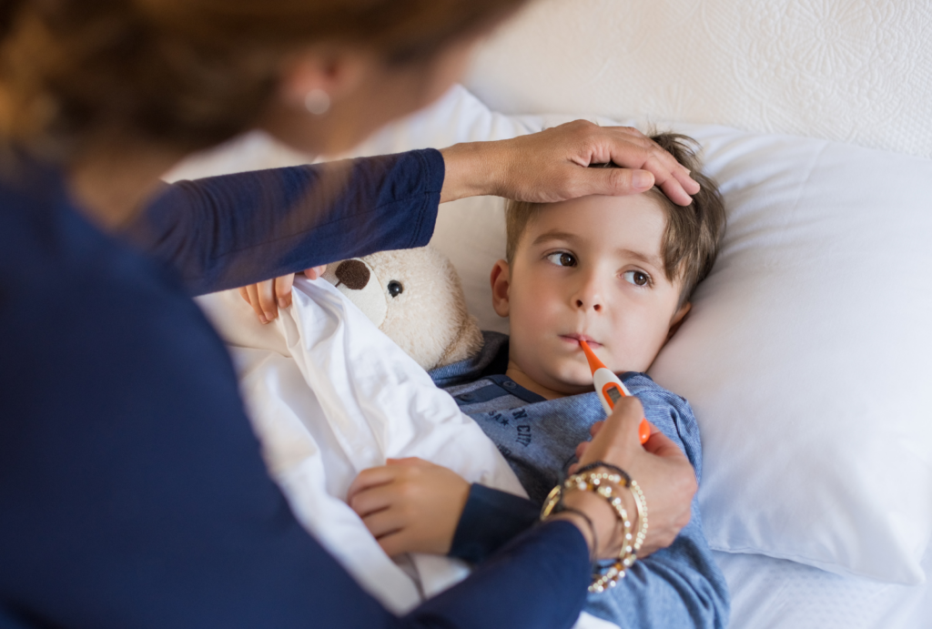 a young child in bed with flu