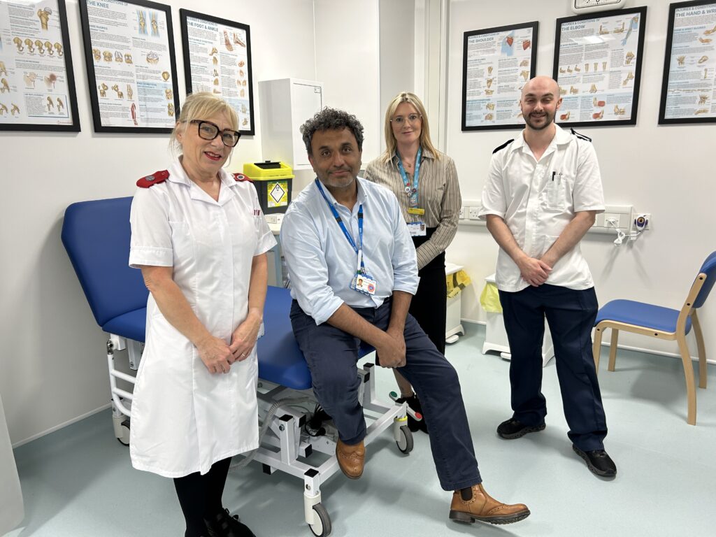 Staff in one of the orthopaedic clinics. From left - Healthcare Support Worker Susan Dobbs, Orthopaedic Consultant Vikas Sharma, Clinical Service Manager Carly Hicks and Staff Nurse Steven Meadows